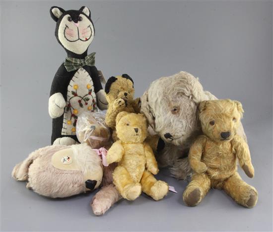 Three bears, a cat, two dogs and a pyjama case, tallest 19in.